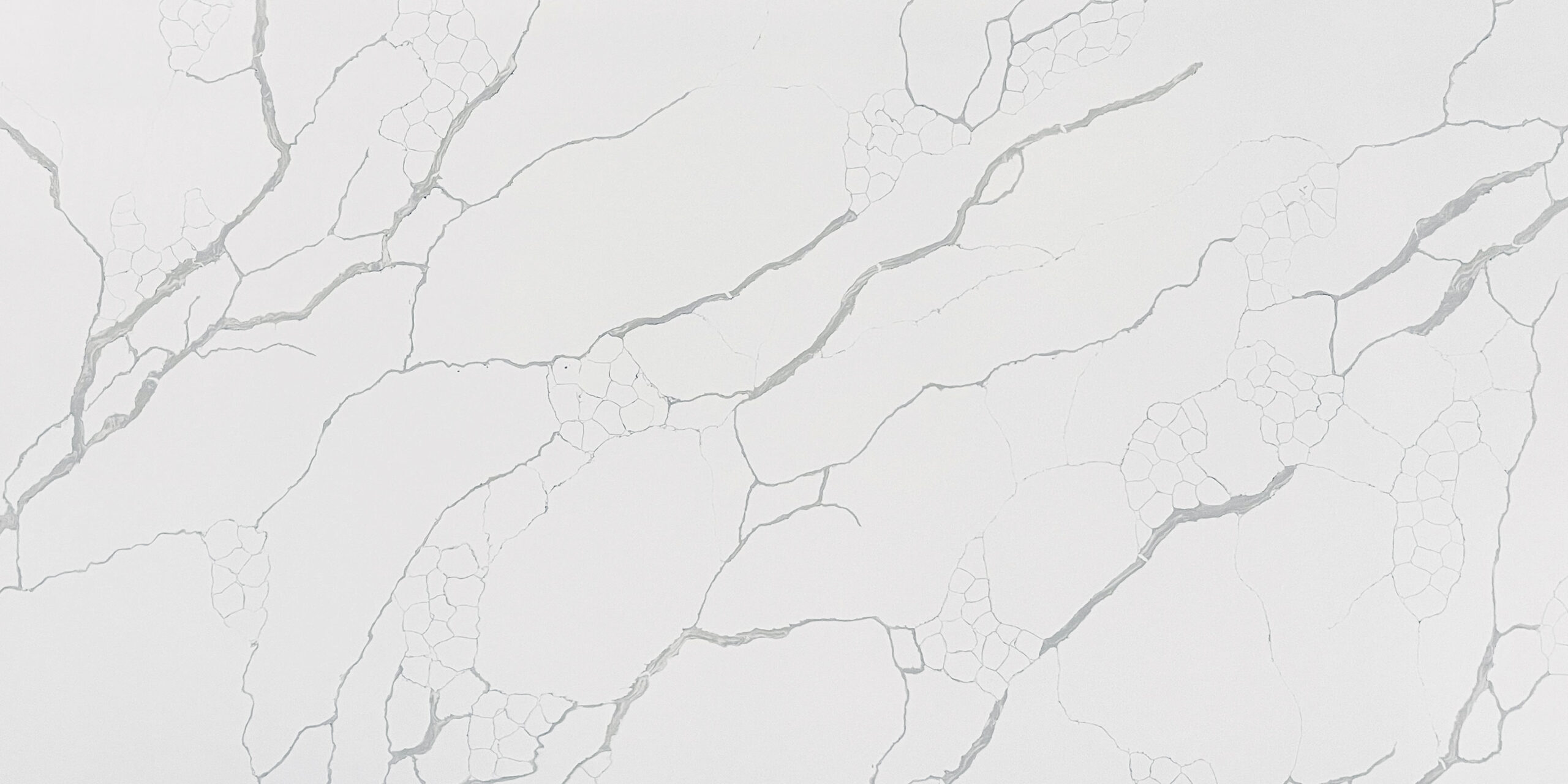 Arabescato IR Quartz by Venezia Surfaces with white background cream shade and gray veins
