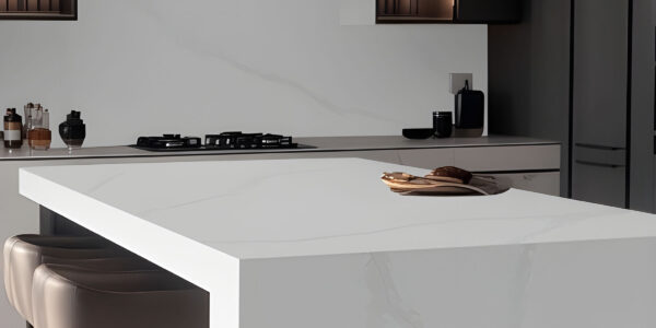 Calacatta Bottega Jumbo Quartz by Venezia Surfaces with white background and soft gray veining