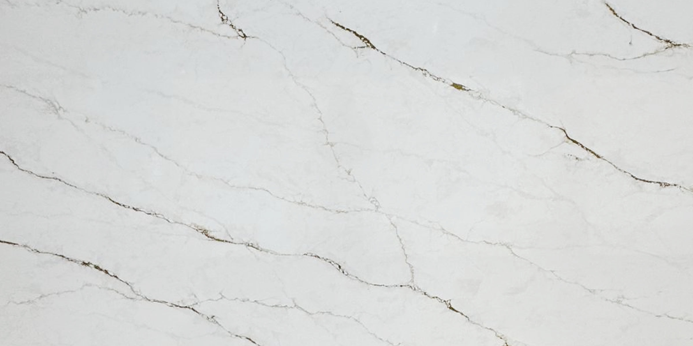 Calacatta Passion Quartz by Venezia Surfaces with white background and soft gray veining