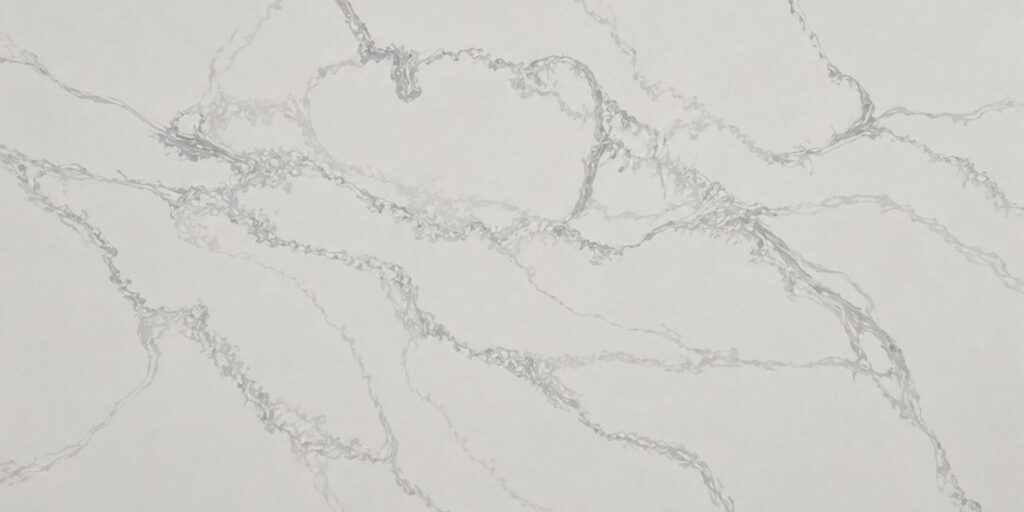 Calacatta Polaris Grey IR Quartz by Venezia Surfaces with white background and soft gray veining
