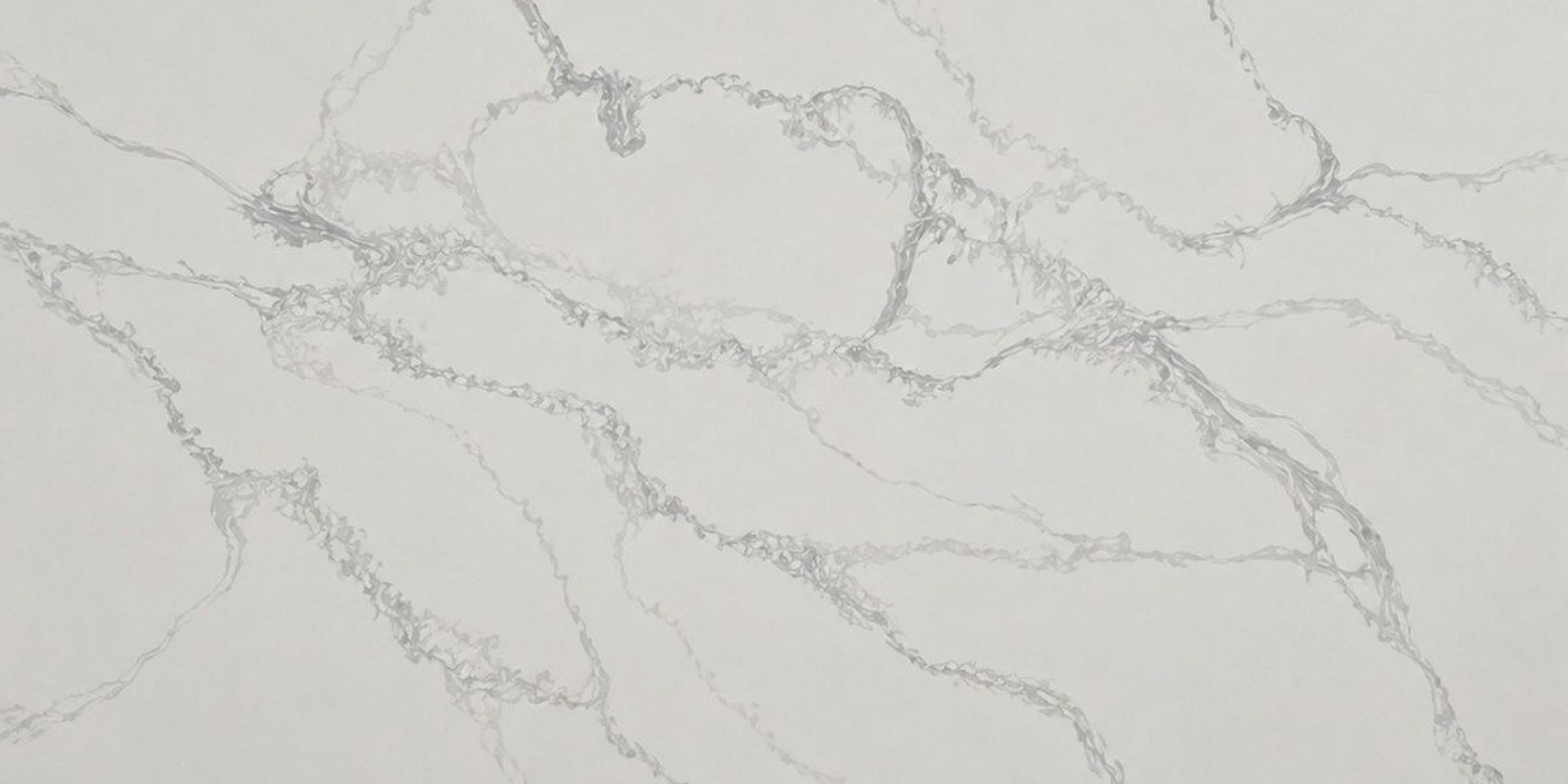 Calacatta Polaris Grey IR Quartz by Venezia Surfaces with white background and soft gray veining