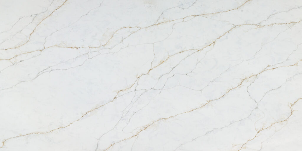 Calacatta Sicilia Quartz by Venezia Surfaces with white background gray veins and soft gold accents