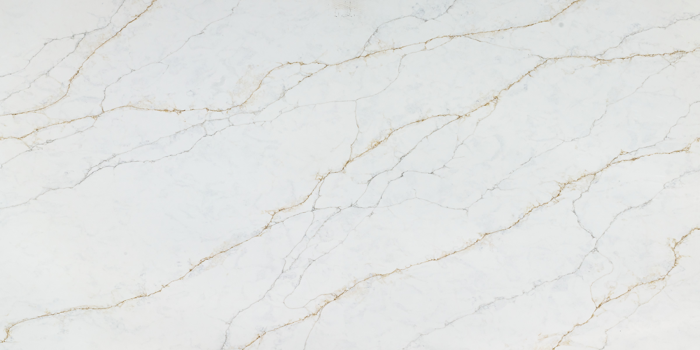 Calacatta Sicilia Quartz by Venezia Surfaces with white background gray veins and soft gold accents