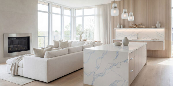 Calacatta Azure Black Fusion Jumbo Quartz by Venezia Surfaces with white background and blue gray veining