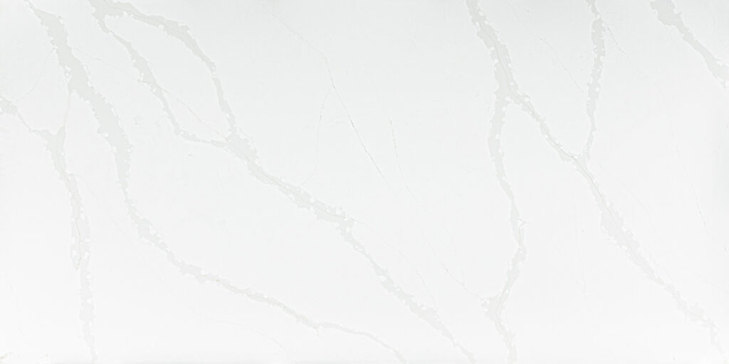 Calacatta Bottega Jumbo Quartz by Venezia Surfaces with white background and soft gray veining