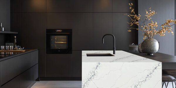 Calacatta Capraia Quartz by Venezia Surfaces with white background and wide soft gray veining
