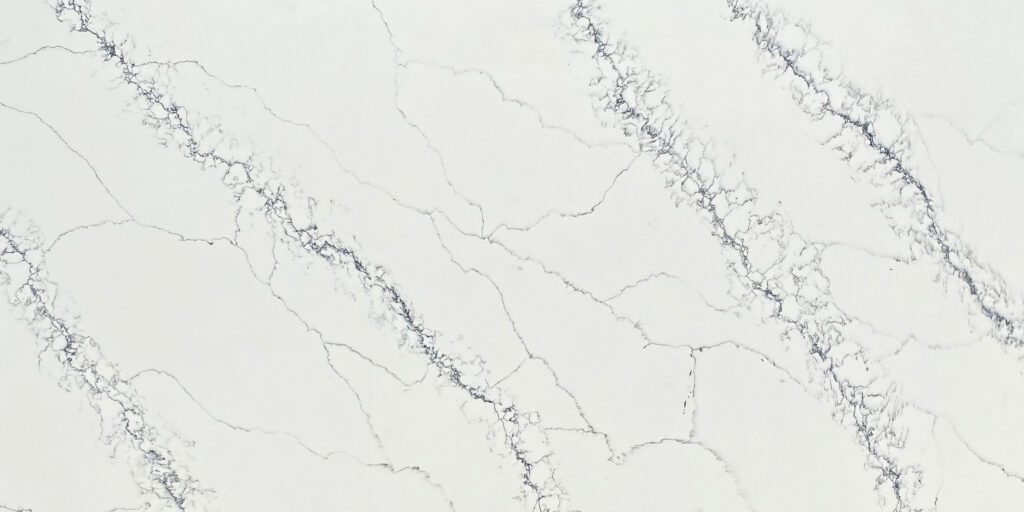 Calacatta Capraia Quartz by Venezia Surfaces with white background and wide soft gray veining