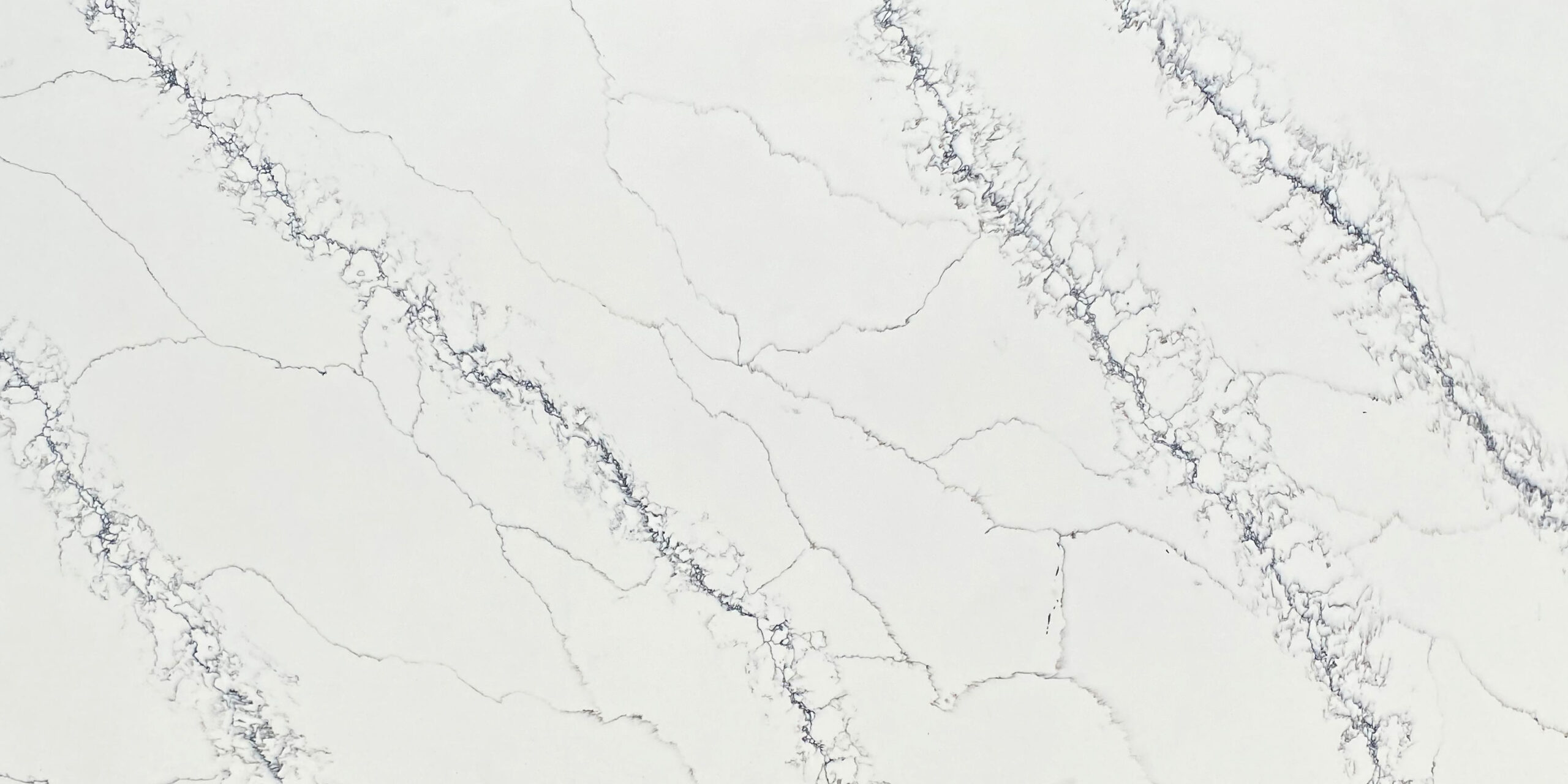 Calacatta Capraia Quartz by Venezia Surfaces with white background and wide soft gray veining