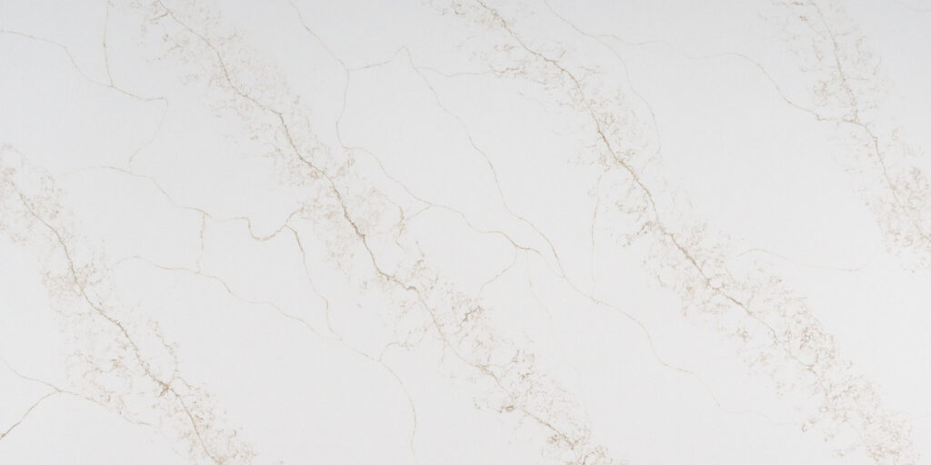 Calacatta Capraia Gold Jumbo Quartz by Venezia Surfaces with white background and soft gold veining