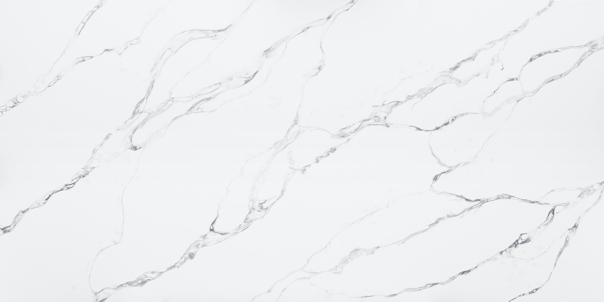 Calacatta Fantasy Jumbo Quartz by Venezia Surfaces with white background and soft gray veining