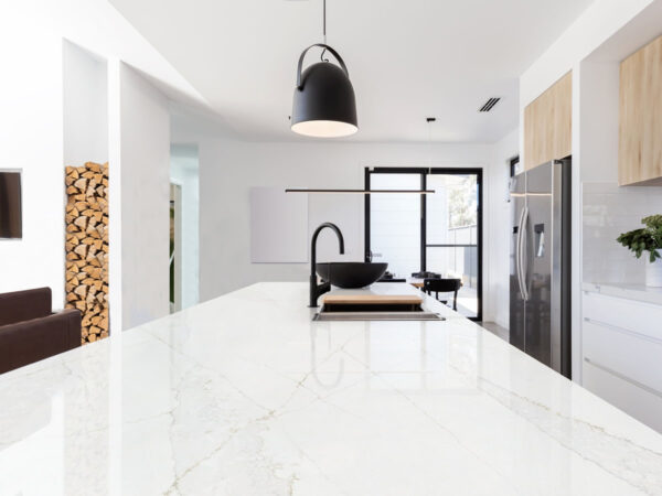 Calacatta Gold Vein Quartz by Venezia Surfaces with white background and prominent gold veining
