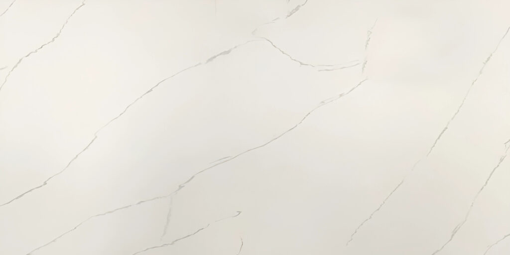 Calacatta Lincoln Jumbo Quartz by Venezia Surfaces with light cream background and subtle gray veining