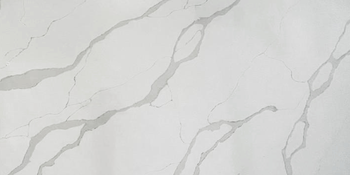 Calacatta Luxury Quartz by Venezia Surfaces with white background and soft gray veining