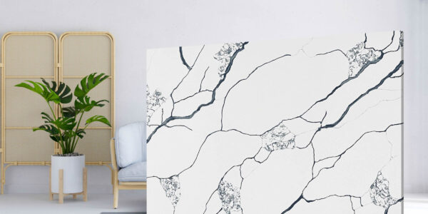 Calacatta Nest Jumbo Quartz by Venezia Surfaces with white background and bold black veining