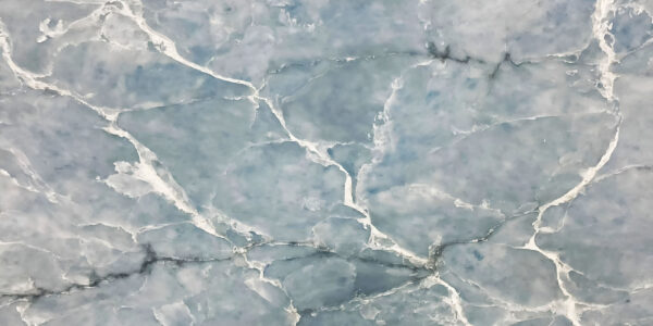 Blue Onyx Quartz by Venezia Surfaces with soft blue tones and white veining