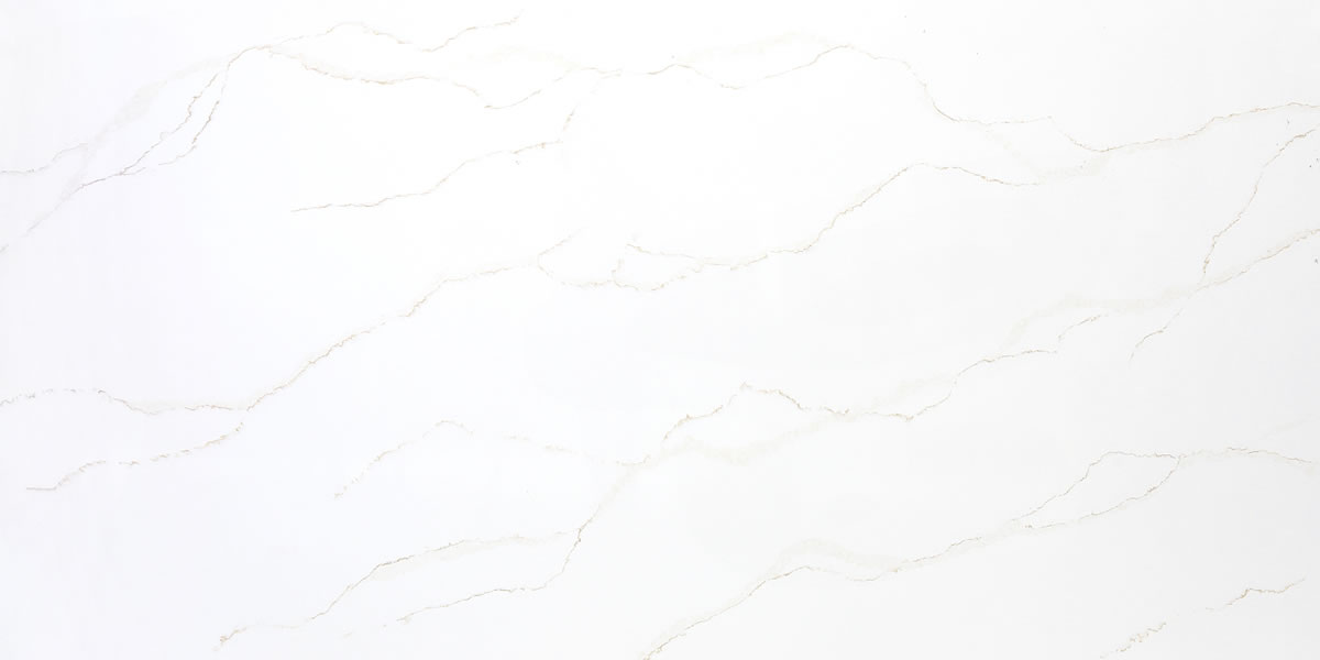 Borghini Gold Jumbo Quartz by Venezia Surfaces with white background and soft gold veining