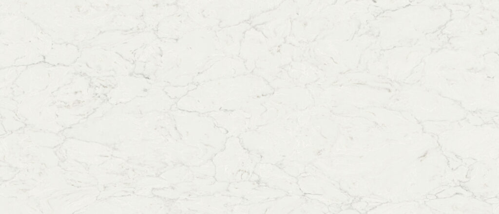 Calacatta Aidana Quartz full slab showing a bright white base with ultra-realistic silver and gray veining.
