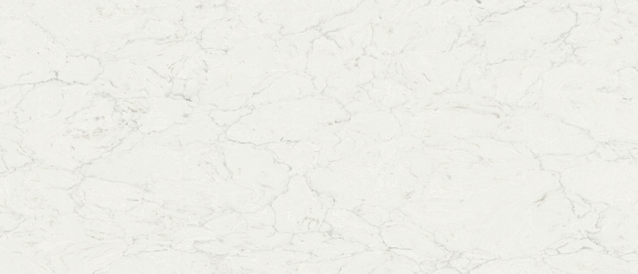 Calacatta Aidana Quartz full slab showing a bright white base with ultra-realistic silver and gray veining.