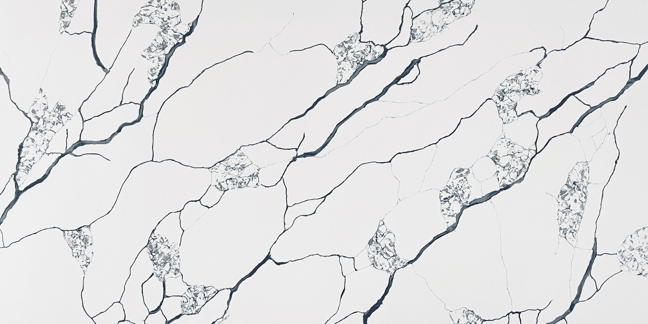 Calacatta Nest Jumbo Quartz by Venezia Surfaces with white background and bold black veining