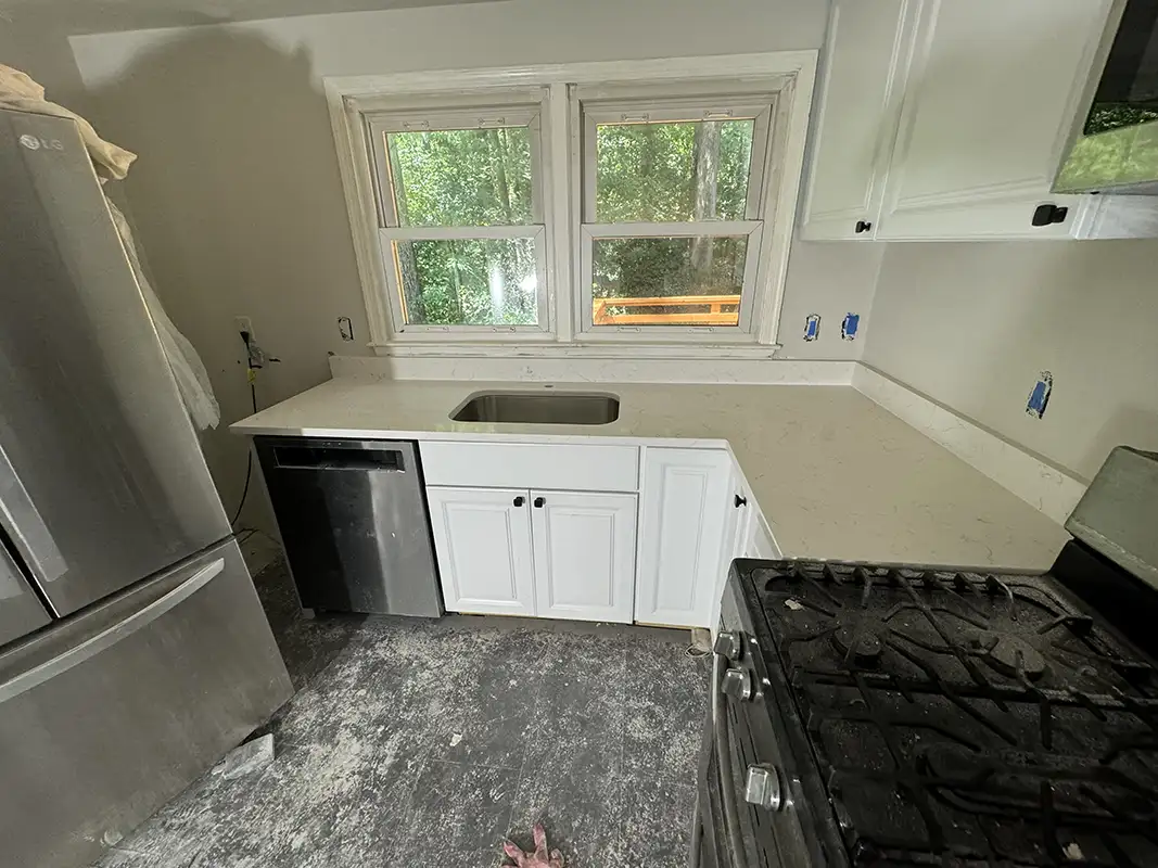 Carrara Delphi kitchen countertops after installation