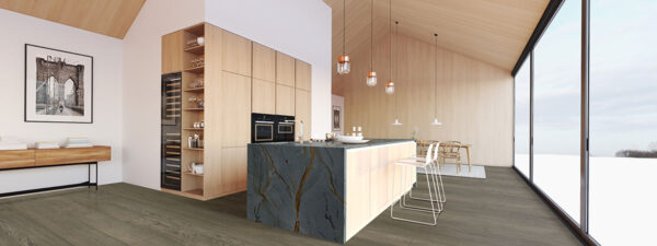 Blue Roma quartzite waterfall island in a modern kitchen