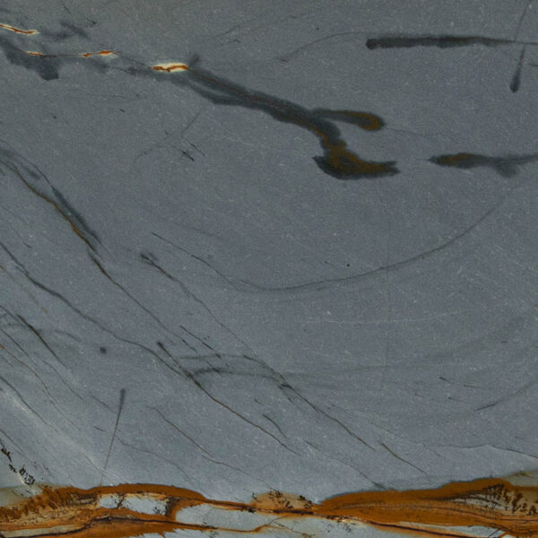 Blue Roma quartzite surface with blue-gray tones and copper-colored veins