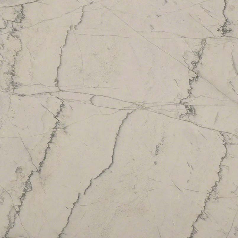 Calacatta Macaubas quartzite surface with a light base and gray veins