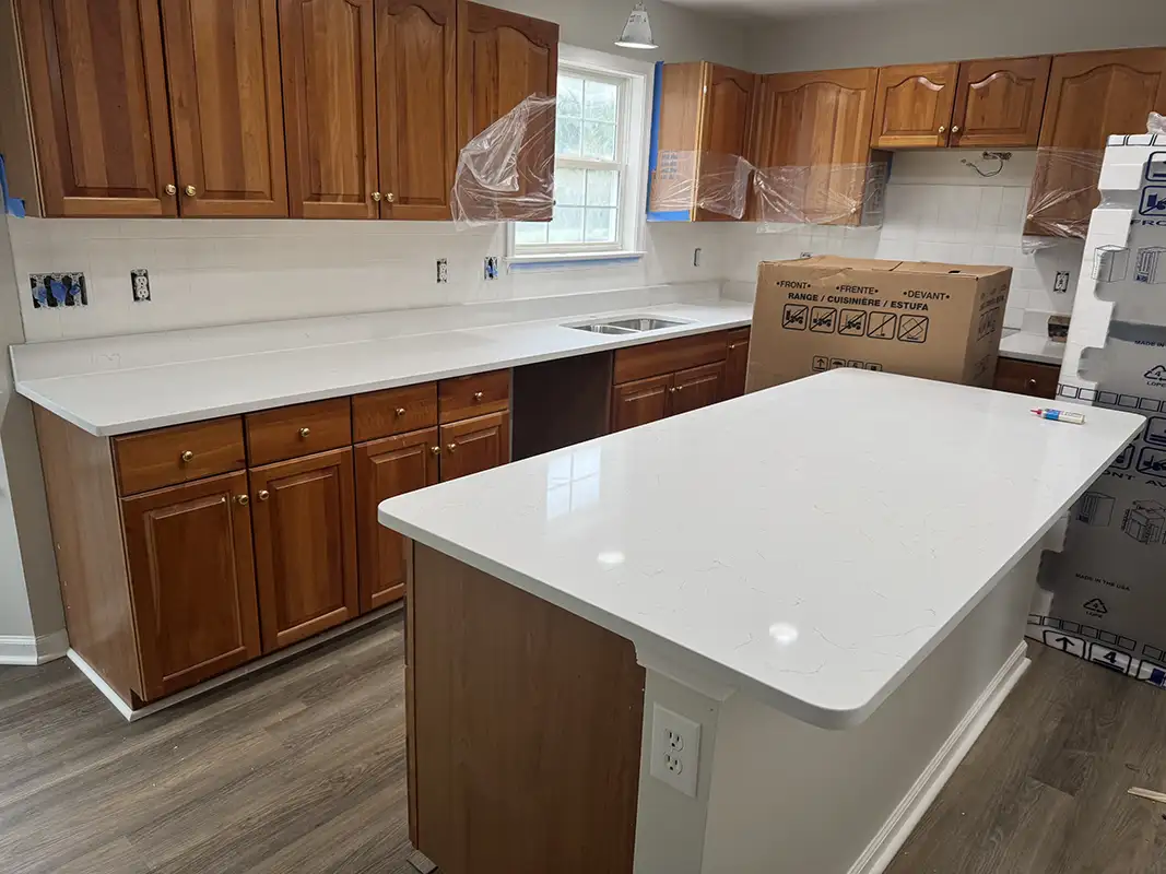 Carrara Delphi island kitchen countertops after installation