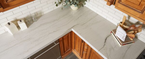 Mont Blanc quartzite countertops in a kitchen with wood cabinetry