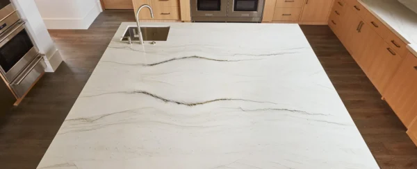 Mont Blanc quartzite kitchen island paired with wood cabinets