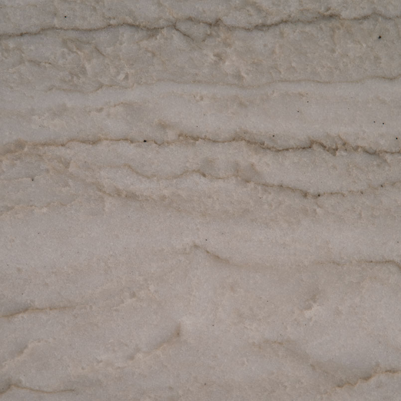 Sea Pearl quartzite surface with flowing gray and taupe bands