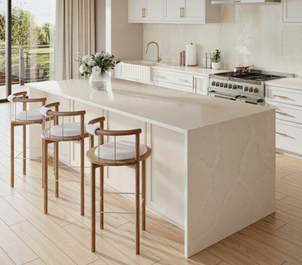 Calacatta Tova Silestone waterfall island in a light kitchen