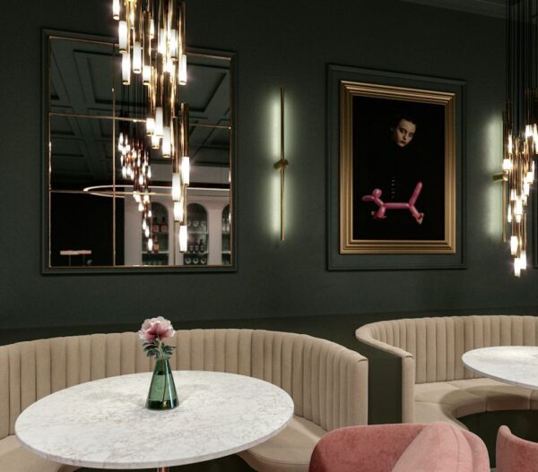 Riviére Rose Silestone round dining tables in a restaurant seating area