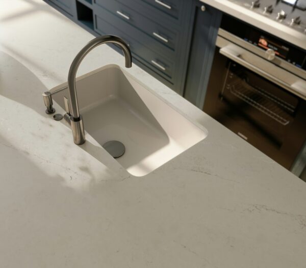 Soft Sand Silestone kitchen island countertop around an undermount sink