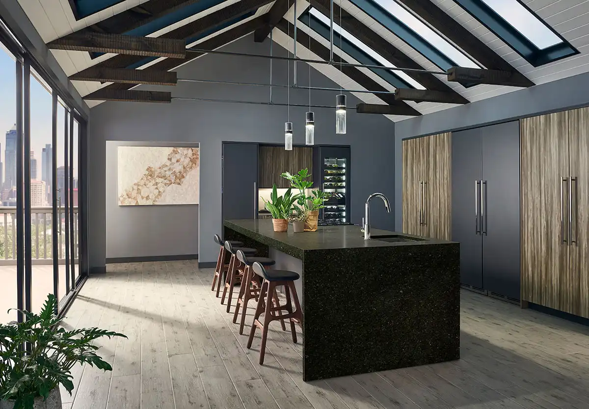 Dark Ubatuba granite kitchen island with a waterfall side